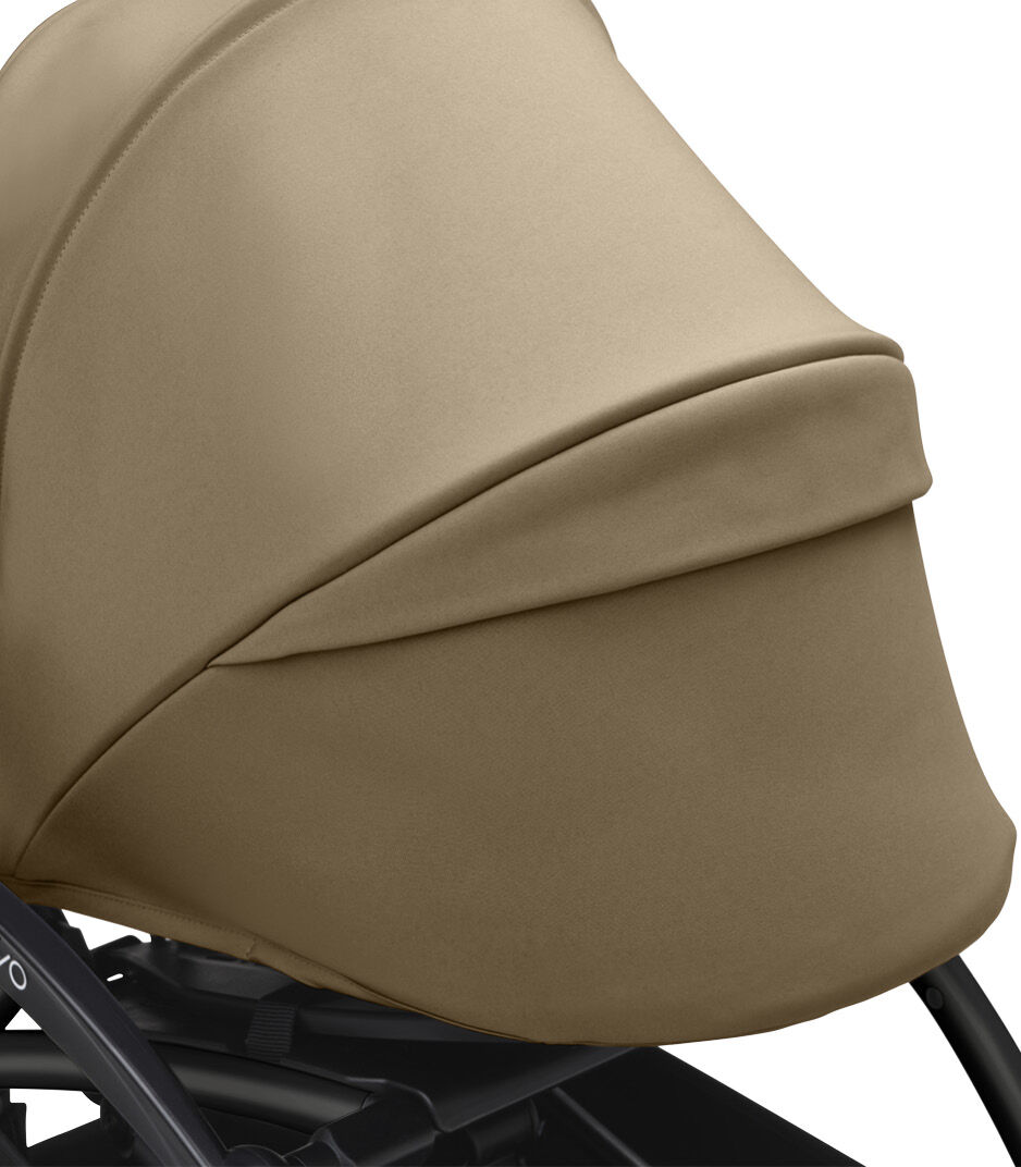 Stokke® YOYO3® 0+ Toffee. Black Frame. Canopy ventilation closed. Close-up. Angled. galery image 4